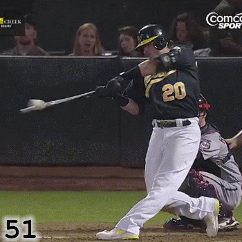 Frame 51: At the Point Of Contact, Josh Donaldson’s hands are still rotating in sync with his back shoulder. Rather than being at full extension at contact, his back elbow is still bent 90 degrees and making the Power L. His front knee is fully extended, having helped to finish his hip rotation.